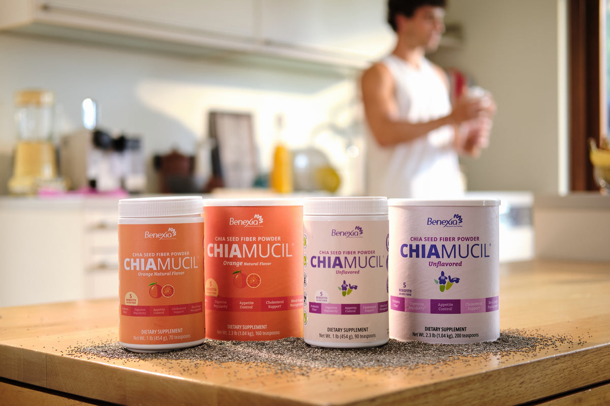 ChiaMucil Orange and Unflavored tins, 1 lb and 2.3 lb, on a kitchen counter